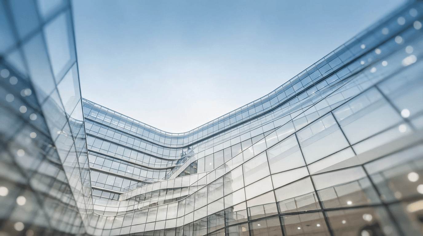 Modern glass curtain wall facade of a commercial building